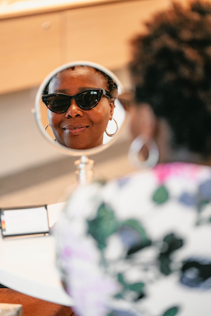 Woman receiving a comprehensive eye exam at Envision Eyecare in Asheville, NC