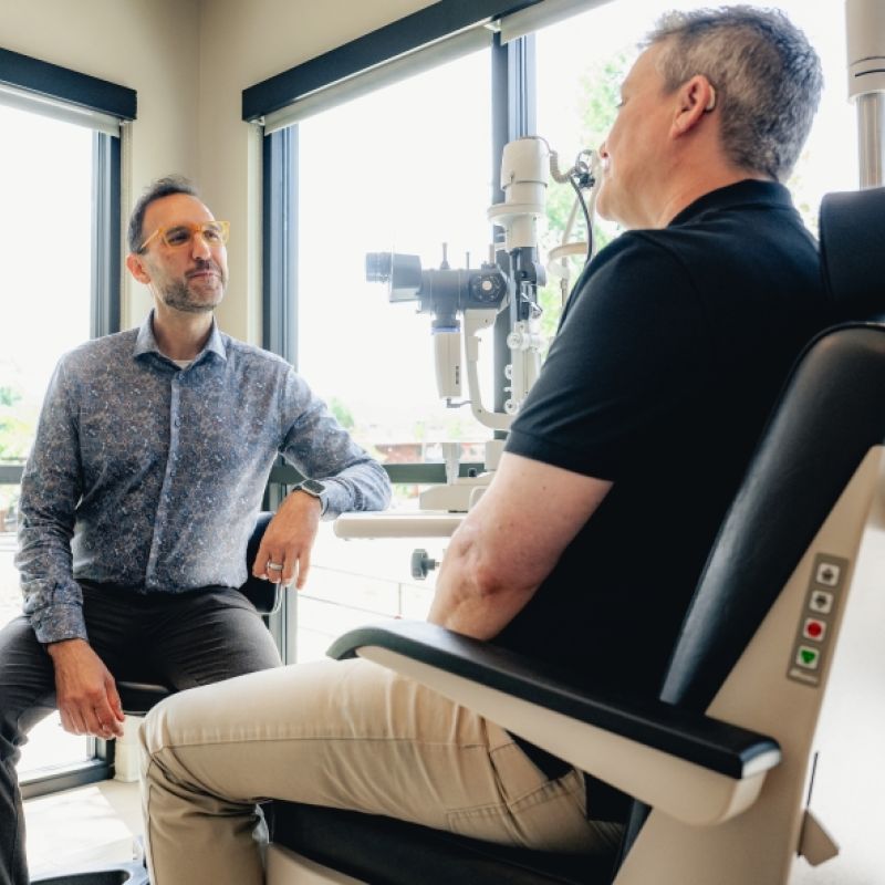 Dr. Larry Golson with a patient at Envision Eyecare